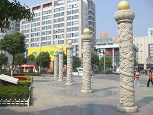 Carved stone columns are a permanent reminder to Taizhou's progress.