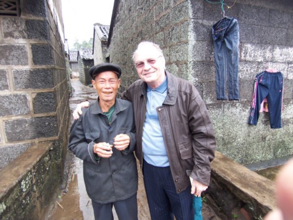 Walking the paths an ancient village, only a few cigarettes convinced this gentleman to pose with me.