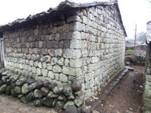 The simple stone-homes protect from rain.