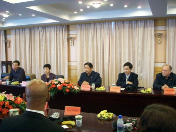 TTC President, Mr. Xu (center), greets the visitors