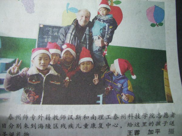 A newspaper-clipping:  A holiday-visit to the school for deaf children in Taizhou.