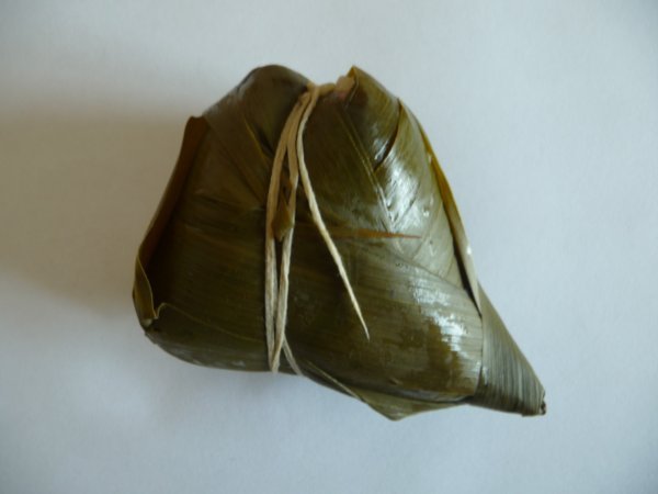 "Zongzi", The food eaten during the Dragon Boat Festival.