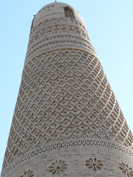 Geometric patterns are created with the use of yellow clay-bricks.