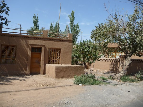 The homes are simple and are constructed with the material of the desert.