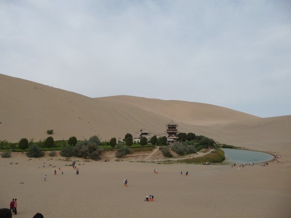The Oasis of the Crescent Spring Lake is completely surrounded by the shifting Sand Dunes.