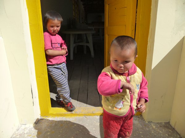 Shy Kazakh children in the mountains surrounding Yining, Xinjiang