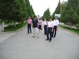 Photo 6:  WALKING THE CAMPUS OF YINING TEACHERS COLLEGE, OUR SISTER COLLEGE 