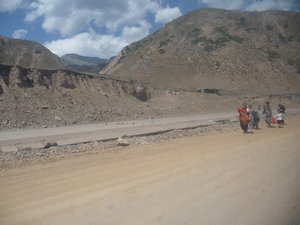 Photo 11: THE ROAD TOWARD SAYRAM LAKE IS UNDER CONSTRUCTION AND VERY DUSTY.