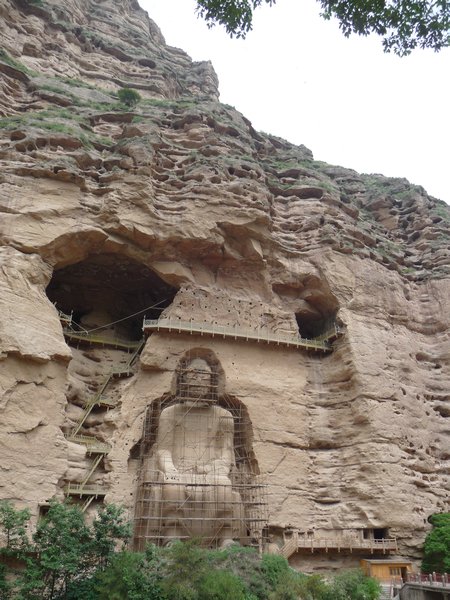 LANZHOU, GANSU; PHOTO 7: The enormous seated Buddha is carved into the Bingling Si 