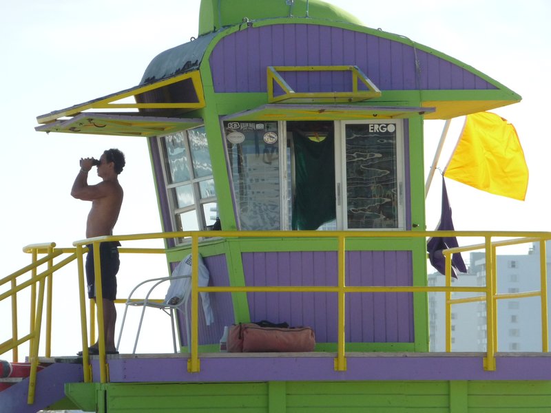 South Beach's Life Guard Stands are famous and colorful.  Life Guards keep watch for any problems in the blue waters of the Atlantic Ocean.