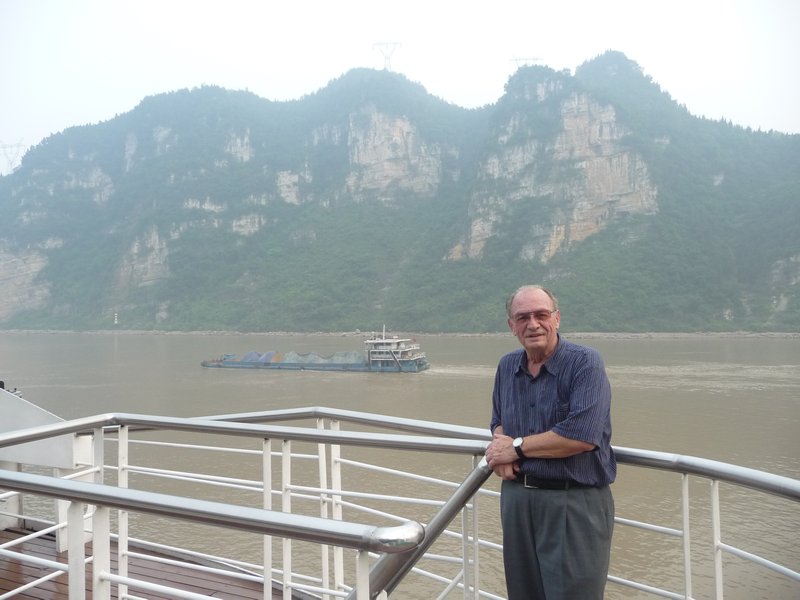 The waterlevel of the Yangtze River beyond the Three Gorges Dam has been raised by 575 feet. What was once a unpredictable river, has now become a more docile style lake.