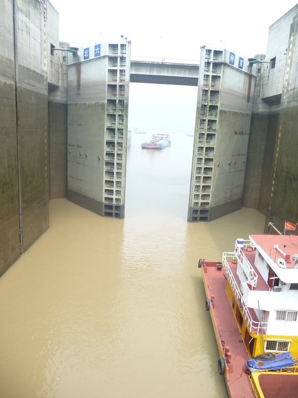 The Giant Gates of the first lock begin to close.
