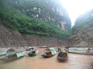 Smaller boat wait for us, to take us further up the Shennong Stream.