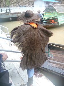 It was raining hard, and the local fishermen modelled their rain-coats.