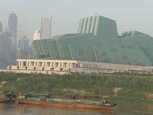 With the towers of Chongqing in sight, we pass the modern new concert hall of Chongqing.