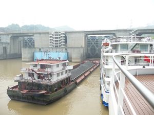 4-6 ships can squeeze into the 5 step lock at the Three Gorges Dam.