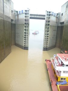 The Giant Gates of the first lock begin to close.