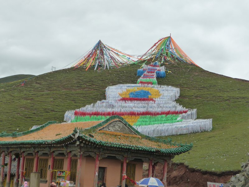 A display of Tibetan-Buddhist prayer flags on the way through the mountains, heading for Qinghai Lake.