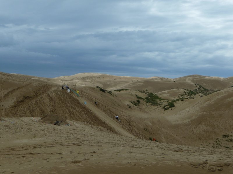 Much of the Qinghai/Tibetan Plateau is covered by desert dunes.  The sky seems to touch the peaks.