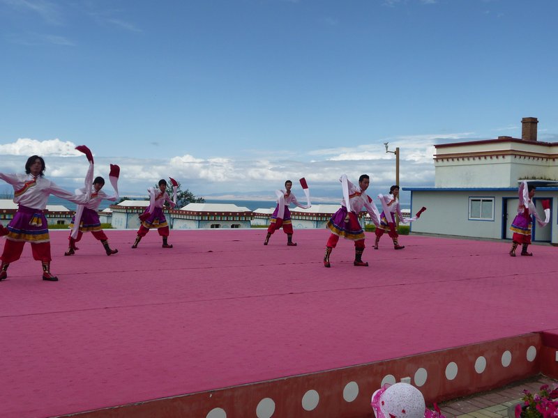 A Tibetan dance greets visitors to Qinghai Lake.