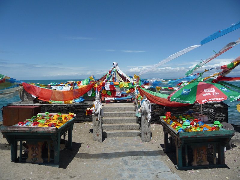 The altar near the shores provides the opportunity to attach your own prayer-flag, or toss a vessel, filled with an offering, into the lake waters.
