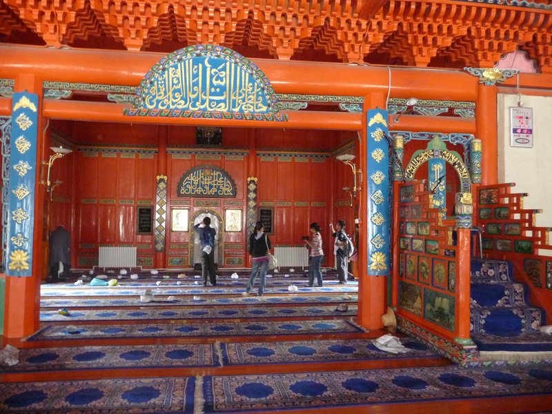 The interior of the prayer hall of the Great Mosque of Xining is made ready for Friday prayers.