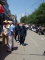Taoist priests walk the Muslim quarter of Xining, Qinghai