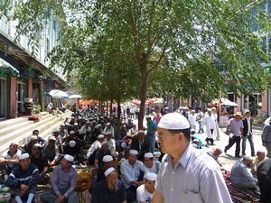 Outside the mosque area, thousands of devotees have already taken their prayer spots under the shade of trees.