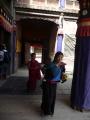 Tibetan Pilgrim walking the halls of the Ta'er Si.