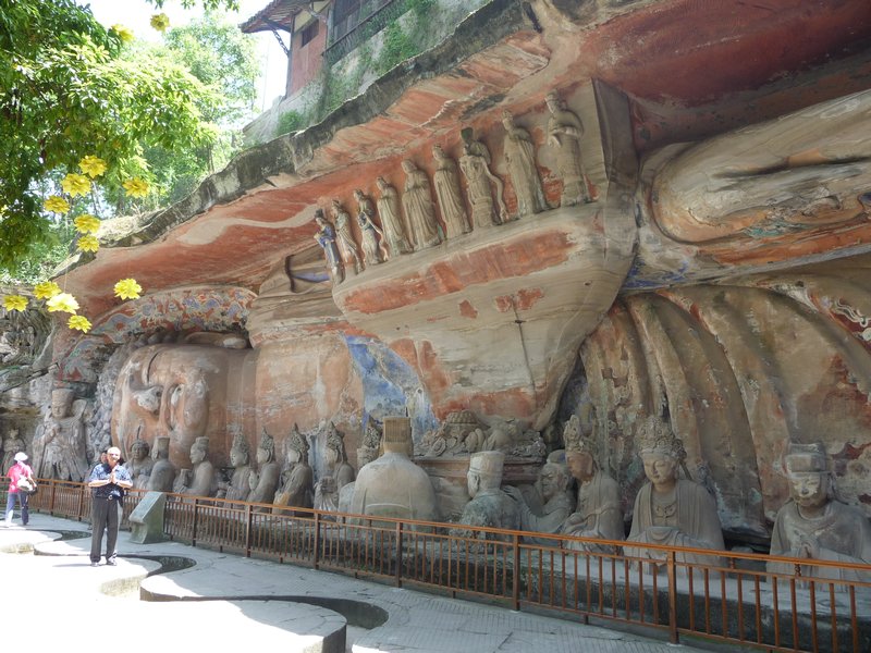 Among the Stone-Carvings of Dazu, the giant Reclining Buddha is one of the most important! "The Nirvana of Sakyamuni" or "Sleeping Buddha", finished between 1127 and 1279, is about 100 feet long. There is a sedateness in his face and closed eyes.