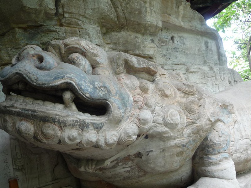 The lion is assigned to Wenshu, the incarnation of Wisdom in Buddhist teaching.