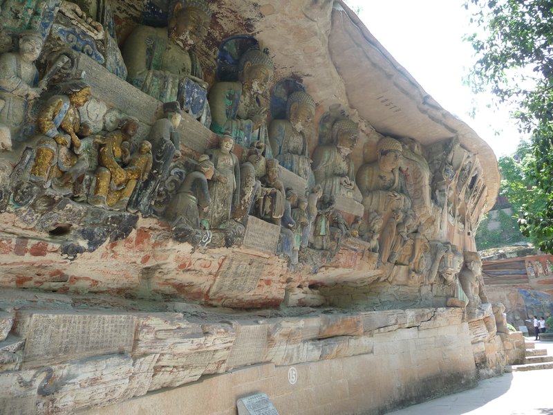 Buddhism and Confucianism co-exist as religious philosophies on the stone walls of Baoding Shan, Dazu Rock Carvings from 1,500 years ago.