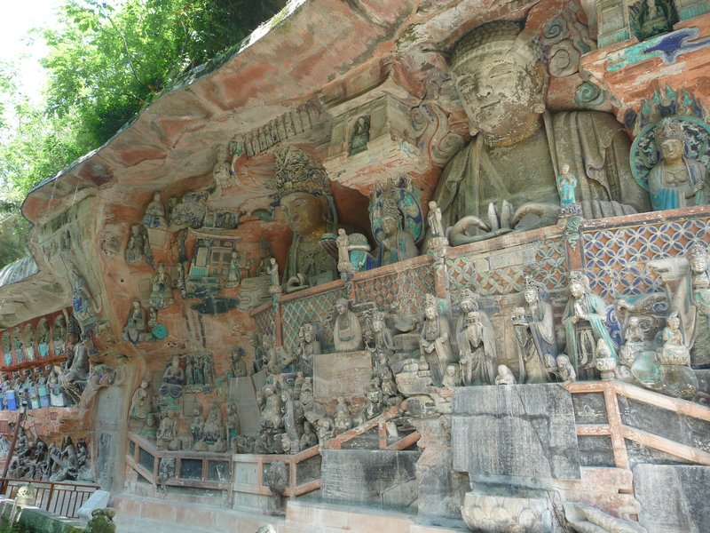 The "Buddhist Teachings in Stone" continue along the wall of The Baoding Shan, in Dazu.
