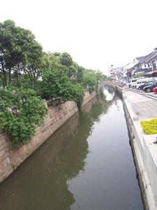 SUZHOU: ALONG ONE OF THE MANY CANALS IN SUZHOU
