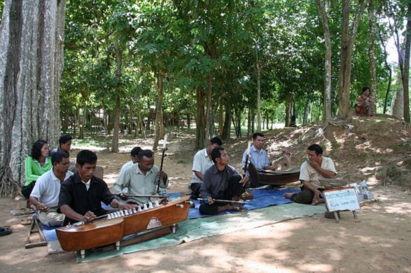 Landmine victims playing celestial music outside Banteay Srei