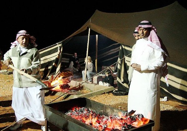 Nasser starting the BBQ fire