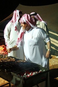 7. Nasser got the hang of BBQing aussie style and is all smiles