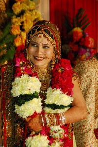 a Bride whose wedding we crashed, one of those rare smiles from an Indian bride...