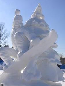 Snowboarder carved from snow!