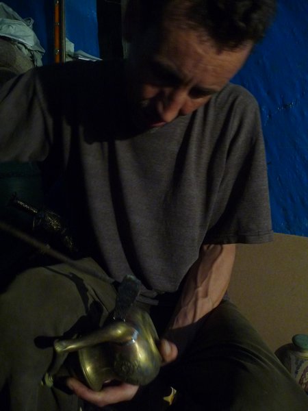 Mohamed repairing a tea pot