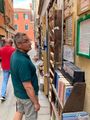 Cay peruses a Venice bookshop