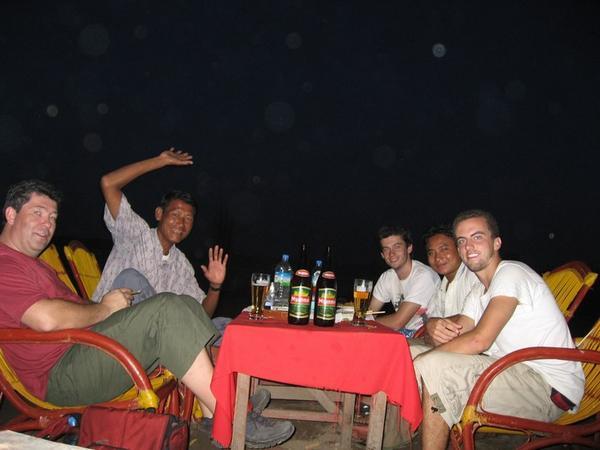 Henk (Netherlands), Soe Soe, me, our driver & Brian enjoy a beer near the U Bein bridge.