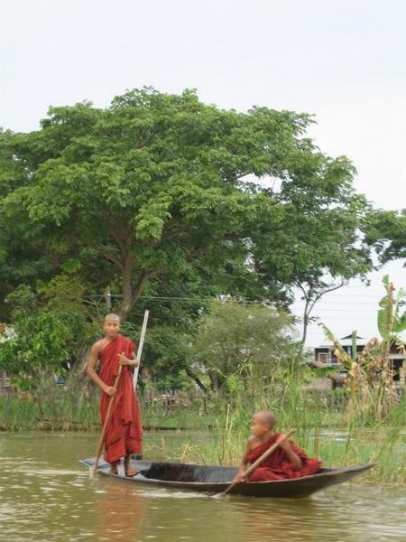 Novice monks on the lake
