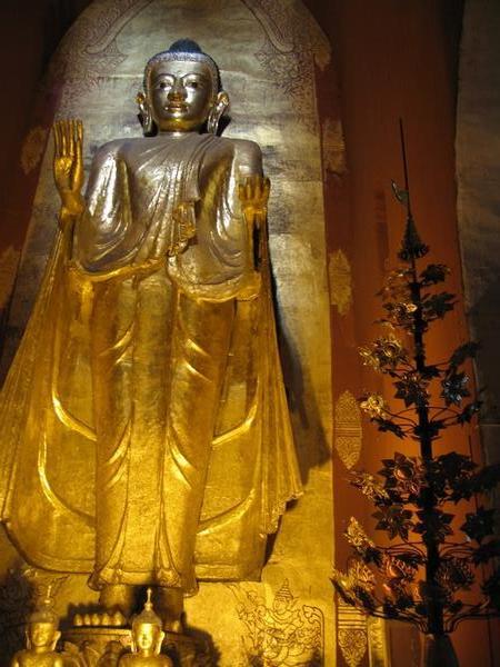Gilded Buddha in one of Bagan's many temples