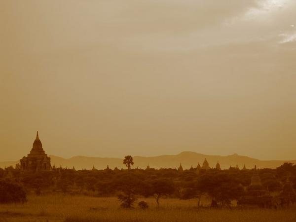 Sepia shot of a lone temple around sunset