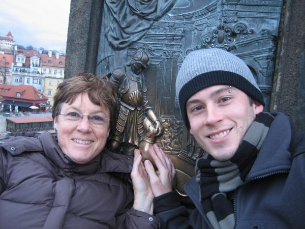 There are two of these brass plates on Charles Bridge; both are rubbed smooth in places for good luck