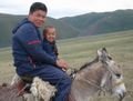 Islan & his little brother on a tiny donkey