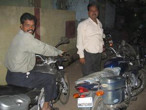Sujal (L) and Jitu (R) with the Bajaj bikes that get us around most places