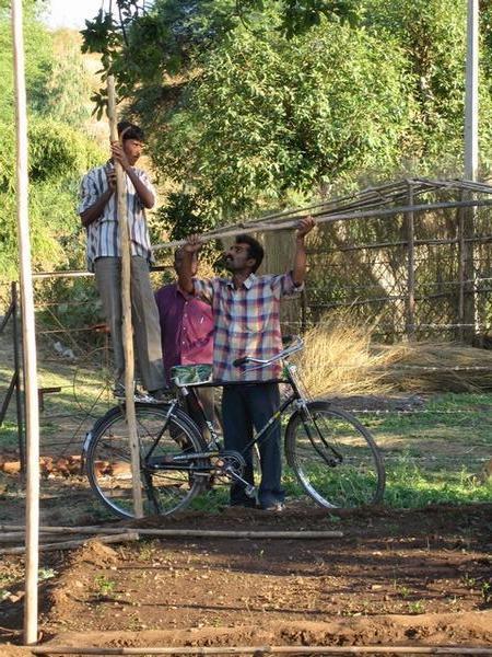 Two of EFICOR's paid 'volunteers', Nilesh & Sudhir, putting up shade netting over the nursery
