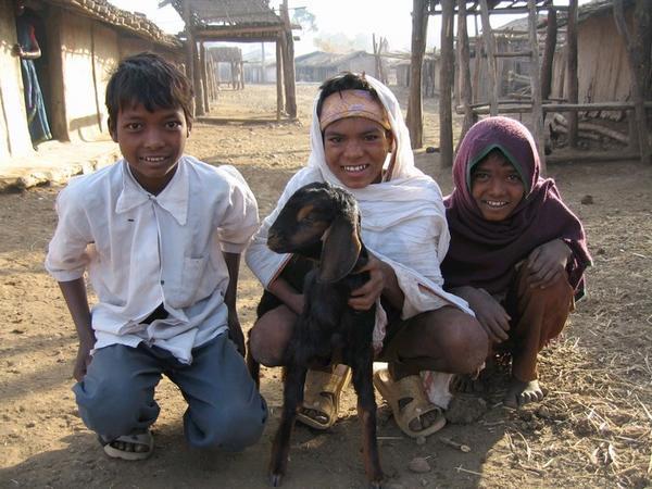 These Hilda kids were very keen to show off their goat to me. =P